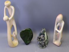 FOUR CARVED SOAPSTONE SCULPTURES to include three group or figural ornaments and a green face mask