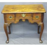 CIRCA 1830 MAHOGANY LOWBOY, rectangular top over an arrangement of three drawers with decorative