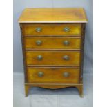 REGENCY STYLE MAHOGANY NEAT NARROW CHEST OF FOUR GRADUATED DRAWERS on splayed feet, 79cms H, 61cms