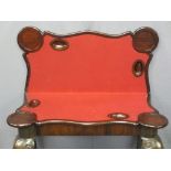 VICTORIAN MAHOGANY FOLD-OVER CARD TABLE with shaped swivel top, interior baize and counter dished