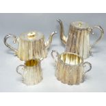 VICTORIAN FOUR PIECE RIBBED EPNS TEASET with bright cut decoration