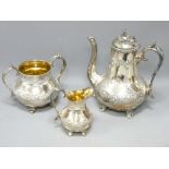 VICTORIAN THREE PIECE EPBM GLOBULAR TEASET with decoration in relief and gilt lined jug and sugar