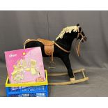 CHILD'S VINTAGE ROCKING HORSE, 80cms max H, 106cms L, 31cms W along with a boxed Acorn doll house
