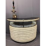 STYLISH MID-CENTURY CURVED HOME BAR in black chrome effect and cream rexine, 105.5cms H, 147cms W,