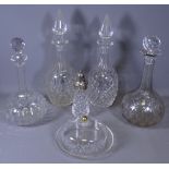 CUT GLASS DECANTERS WITH STOPPERS, a pair, with two further decanters and stoppers, butter dish