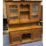 REPRODUCTION PINE GLASS TOP DRESSER having twin astragal glazed doors and central shelving and three