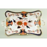 A SWANSEA PORCELAIN IMARI CENTRE DISH circa 1815-17 on a shaped rectangular base and with twig-