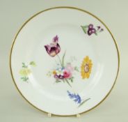 A SWANSEA PORCELAIN FLORAL DECORATED PLATE with off-centre spray of flowers and outer sprigs