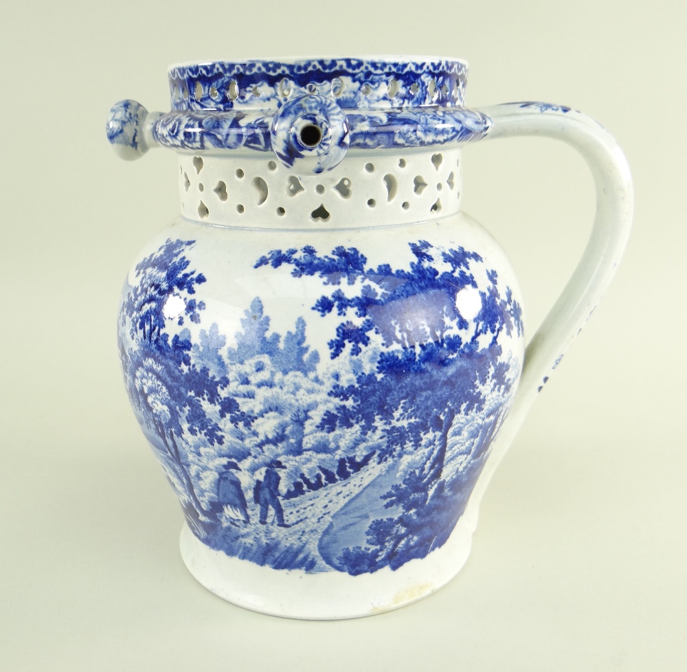 A GLAMORGAN EARTHENWARE PUZZLE JUG IN THE 'PULTENEY BRIDGE' TRANSFER PATTERN of bellied form with