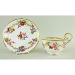 A NANTGARW PORCELAIN BREAKFAST CUP & SAUCER being the type with inverted heart-shaped handle curving