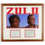 STANLEY BAKER & IVOR EMMANUEL AUTOGRAPHS in pen and on separate sheets, framed with a Zulu