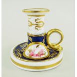 A RARE NANTGARW PORCELAIN TAPERSTICK circular based with dolphin handle and with stepped nozzle, the
