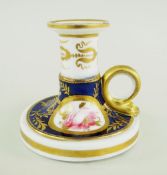 A RARE NANTGARW PORCELAIN TAPERSTICK circular based with dolphin handle and with stepped nozzle, the