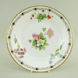 A SWANSEA PORCELAIN PLATE DECORATED BY WILLIAM POLLARD of circular form, painted with a centred