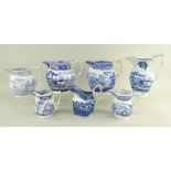 SEVEN VARIOUS SWANSEA POTTERY BLUE & WHITE TRANSFER JUGS comprising (1) 'Drover' example with