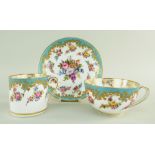 A NANTGARW PORCELAIN TRIO comprising breakfast cup, coffee can and saucer, decorated in the early-