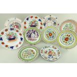 GROUP OF SWANSEA POTTERY COLOURFULLY HAND-PAINTED PLATES including five ribbon plates with moulded
