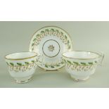 A SWANSEA PORCELAIN TRIO the cups with curvaceous ogee handles and decorated with Pattern No. 251