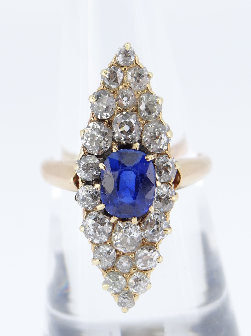 VICTORIAN MARQUISE SHAPE DIAMOND & SAPPHIRE RING, 22 claw set diamonds with central sapphire (0.7