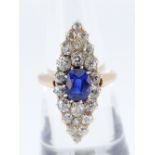 VICTORIAN MARQUISE SHAPE DIAMOND & SAPPHIRE RING, 22 claw set diamonds with central sapphire (0.7