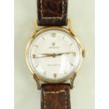 9CT GOLD ROLEX PRECISION WRISTWATCH, the silvered dial having raised gilt baton markers and Arabic