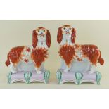 RARE PAIR OF VICTORIAN STAFFORDSHIRE POTTERY SPANIELS 'GRACE' & 'MAJESTY', c. 1850, crisply modelled