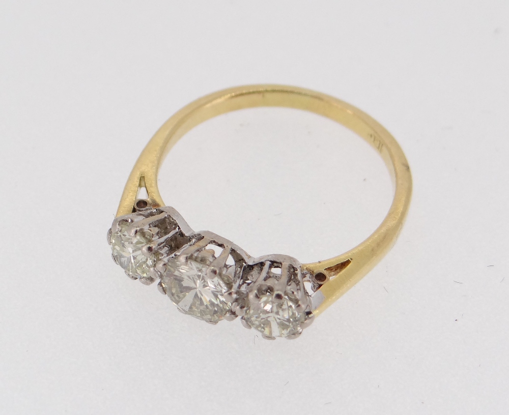 18CT GOLD THREE STONE DIAMOND RING, the three claw set stones totalling 1.0cts approximately (visual - Image 2 of 3