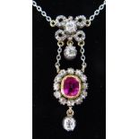 PINK SAPPHIRE & DIAMOND PENDANT NECKLACE having a 7mms central sapphire and diamond cluster with 0.