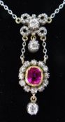 PINK SAPPHIRE & DIAMOND PENDANT NECKLACE having a 7mms central sapphire and diamond cluster with 0.