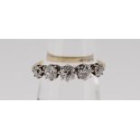 18CT GOLD FIVE STONE DIAMOND RING the five claw set stones totalling 0.75cts approximately (visual