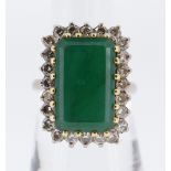 18CT GOLD EMERALD & DIAMOND CLUSTER RING, the large rectangular emerald (1.5 x 0.9cms) surrounded by