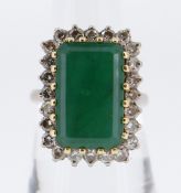 18CT GOLD EMERALD & DIAMOND CLUSTER RING, the large rectangular emerald (1.5 x 0.9cms) surrounded by