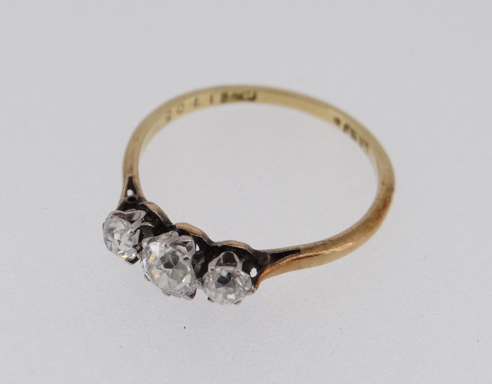 YELLOW METAL THREE STONE DIAMOND RING, the three claw set stones totalling 0.50cts approximately. - Image 2 of 2