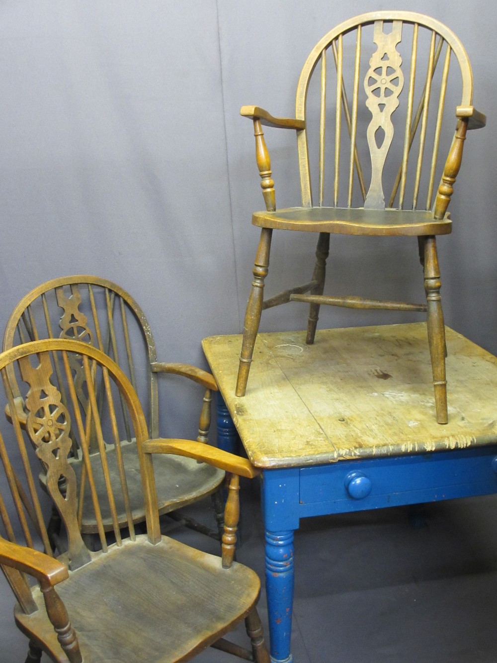 PAINTED PINE SCRATCH TOP FARMHOUSE TABLE with single end drawer and three Priory style wheelback