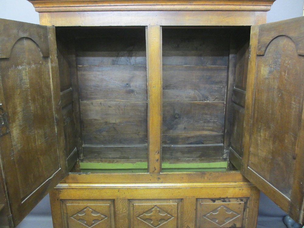 CIRCA 1800 CARVED OAK PRESS CUPBOARD with fan detail and Gothic type crosses on shaped and chamfered - Image 6 of 7