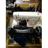 THREE VINTAGE SEWING MACHINES including a cased hand crank example by Singer, a 99K as the