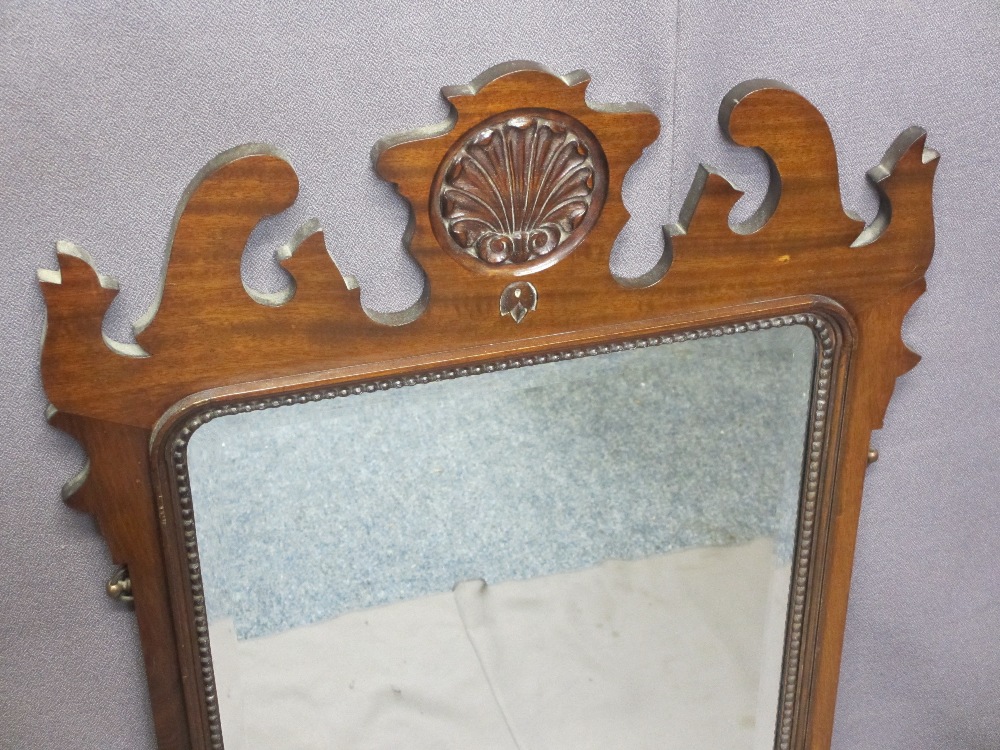 GEORGIAN STYLE REPRODUCTION MAHOGANY WALL MIRROR with shaped and carved detail and bevelled edged - Image 2 of 2