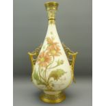 LARGE ROYAL WORCESTER TWIN-HANDLE VASE with raised floral decoration on cream ground, gilt