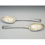 GEORGE IV BERRY SERVING SPOONS, a pair by William Bateman, London 1832, having ornated chased