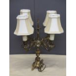 BRASS FOUR BRANCH CANDELABRA (converted), 52cms H with shades
