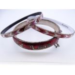 A STERLING SILVER & RED ENAMEL THAI BANGLE with boats and figures etc, 27.7grms and two small
