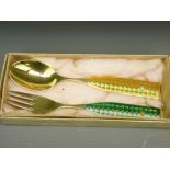 ANTON MICHELSEN STYLISH DANISH SILVER, gilt and enamel fork and spoon set, designed by Rolf