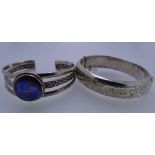 TWO BANGLES, one a 925 silver triple split bangle with large centre abalone, 31.5grms and a hollow