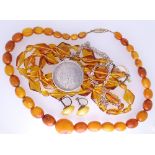 GRADUATED AMBER NECKLACE, 25grms, George IV 1926 half-crown and vintage amber glass necklaces ETC,