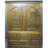 CIRCA 1800 CARVED OAK PRESS CUPBOARD with fan detail and Gothic type crosses on shaped and chamfered