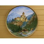 LARGE AUSTRIAN ? POTTERY WALL CHARGER depicting an alpine scene, marked 'Burg Taufers in Tirol,