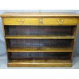 MAHOGANY STANDING BOOKCASE with two upper drawers and carved front detail on a plinth base, 105.5cms