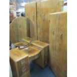 GOOD ART DECO PERIOD THREE PIECE WALNUT BEDROOM SUITE comprising a two door wardrobe, 190cms H,