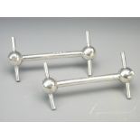 SPUTNIK END EDWARDIAN KNIFE RESTS, a pair, Birmingham 1906 in solid silver by G & J Bushell, 4