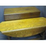 ANTIQUE OAK DROP-LEAF TABLE and a reproduction oak low drop-leaf table, 73cms H, 105cms L, 50.5cms W